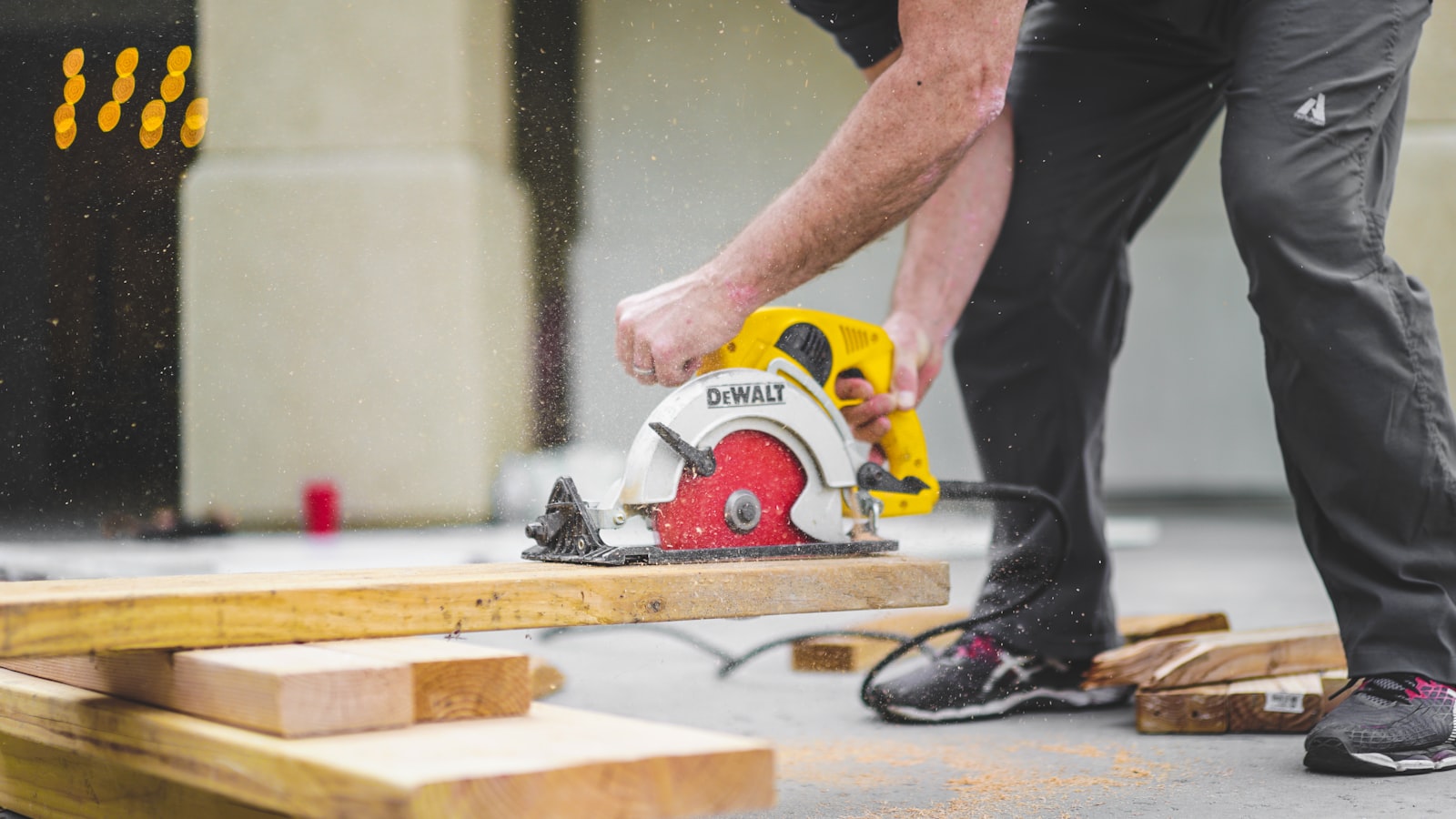 A craftsman working on timber detailing